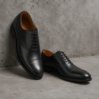 Chaussure Derby en cuir noir vue de face