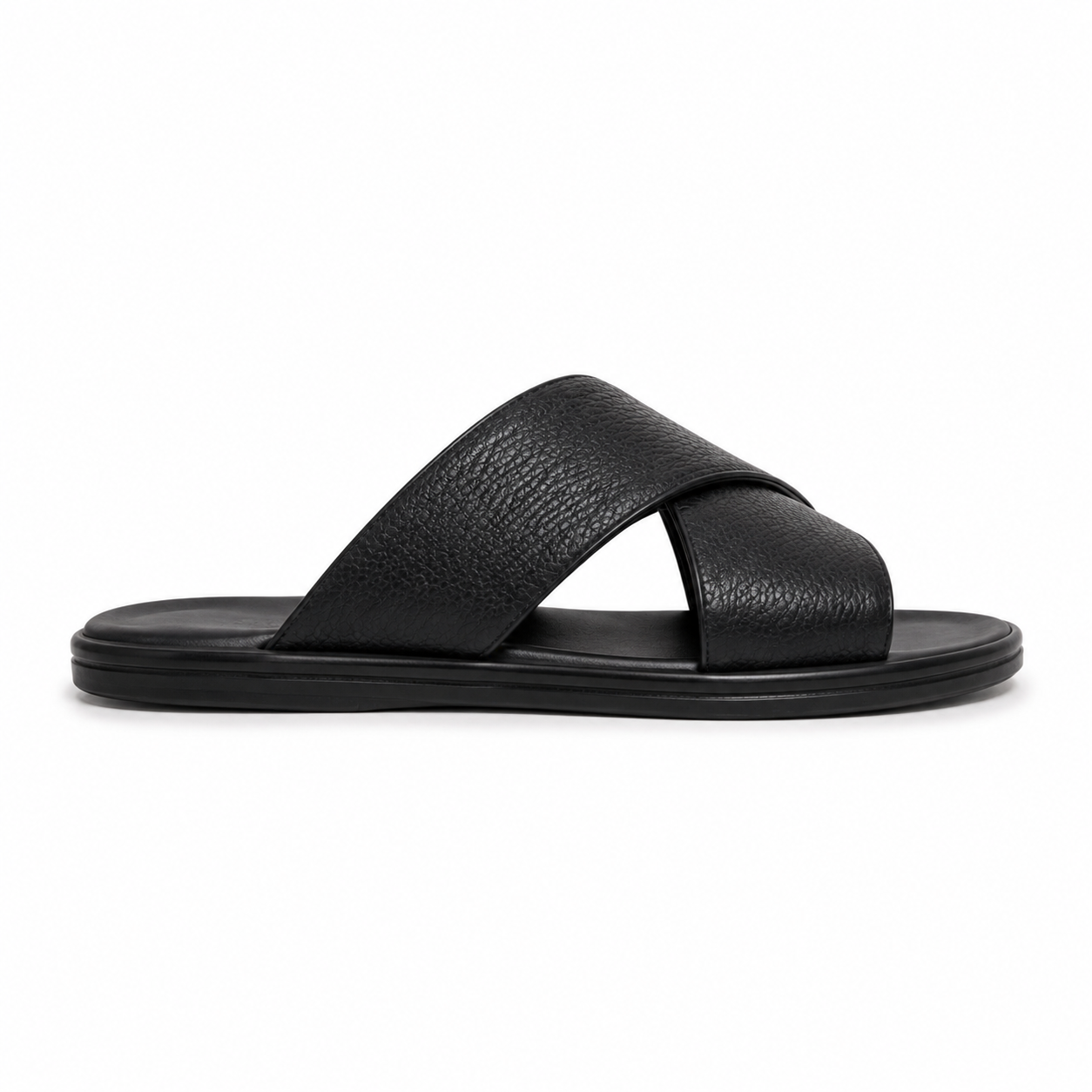 Semelle intérieure des sandales en cuir noir.