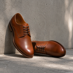 Chaussure Derby en cuir marron vue de face